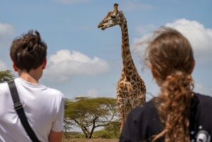 Kenia - giraffe en kids